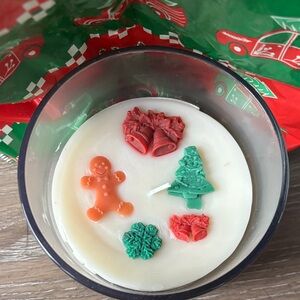 Festive Holiday Candle with Christmas Decorations